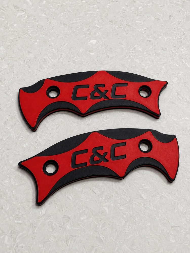 Red and black C&C branded knife scales